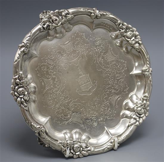 A Victorian silver waiter with rose and thistle border, crested, John & Henry Lias, London, 1844. 14.5 oz.